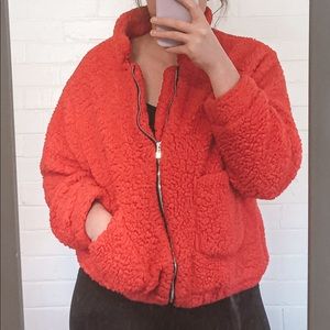 Warm and fuzzy bright pink zip up oversized jacket.